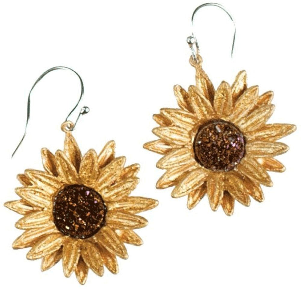 Gold sunflower earrings on a white background