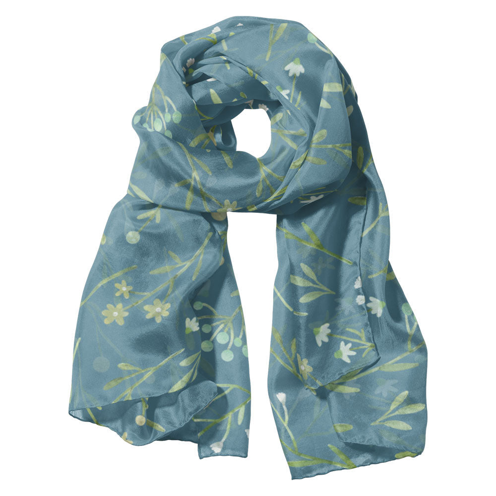 Blue floral patterned scarf on a white background