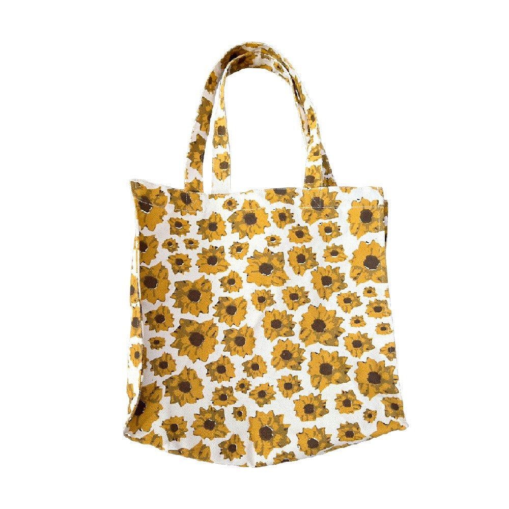 Reusable shopping bag with sunflower pattern on a white background